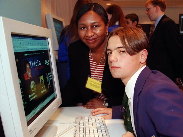 Pupil question time at the Stakis hotel, Blackpool - Veron Strachan from the BBC shows Liam Hargreaves from Highfield High school how to use the Internet in 1999