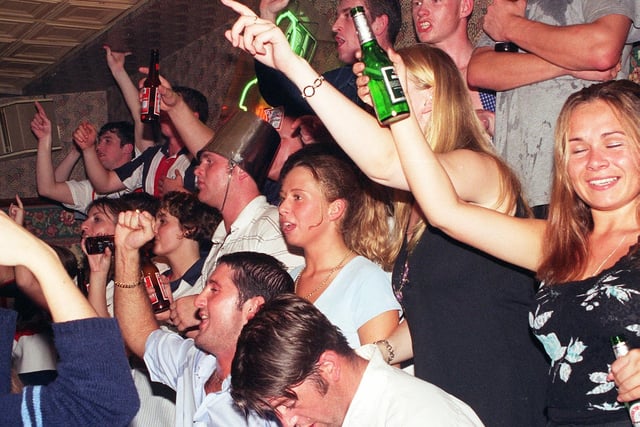Jubilant England fans at Blackpool's No.3 pub watching their teams victory over Columbia in 1998