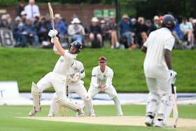 Lancashire's fielders look on as Kent's Ben Compton pulls Chris Green for a boundary at Blackpool CC Photo: Luke Adams