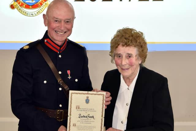 Barbara Brook receives her award