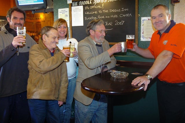 The Saddle pub on Whitegate Drive in Blackpool won CAMRA's Pub of the Year award for Fylde in 2007. Regulars queue up to congratulate landlord Alan Bedford on the award