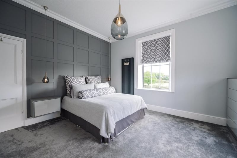 A cool grey colour scheme for one of the bedrooms - it has amazing views too