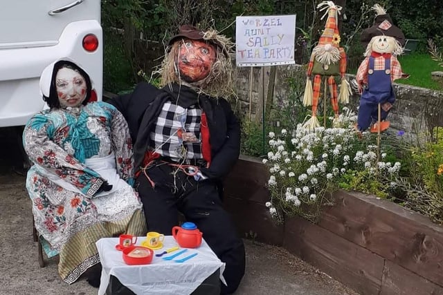 Scarecrows enjoying a tea party