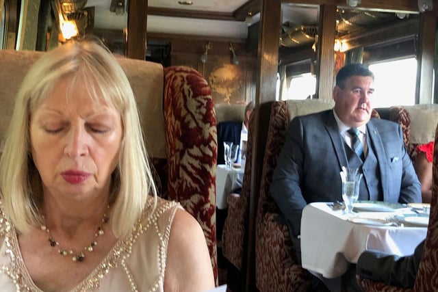 What's for lunch ... passengers study the dinner menu aboard the Northern Belle