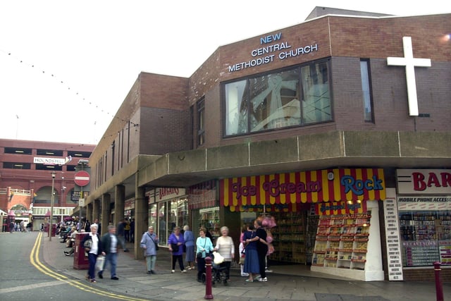 This is a popular corner in Adelaide Street. Lots of different shops have occupied the site - this was 2002 when there was a bargain store there