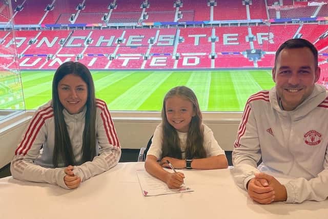 Ola Wileman signs for Manchester United