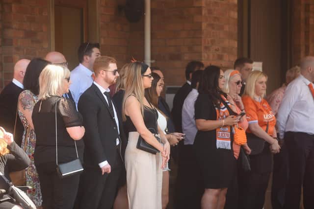 Family and friends during the funeral of Chris Beveridge at Lytham Crematorium
