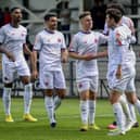 AFC Fylde players congratulate Connor Barrett after his goal against Salford City at Mill Farm Picture: Steve McLellan