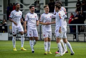 AFC Fylde players congratulate Connor Barrett after his goal against Salford City at Mill Farm Picture: Steve McLellan