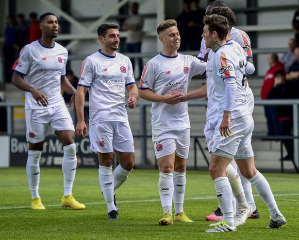 AFC Fylde players congratulate Connor Barrett after his goal against Salford City at Mill Farm Picture: Steve McLellan