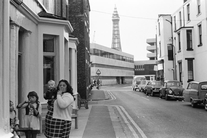 A brilliant scene which shows a young family outside their back street B&B in 1974