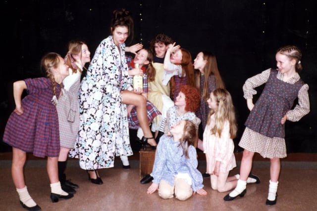 Pictured are the orphans and Miss Hannigan, played by Laura Darkins, in Lytham St Annes Youth Theatre's production of the musical Annie