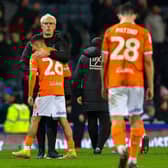 McCarthy hugs Ian Poveda after the game