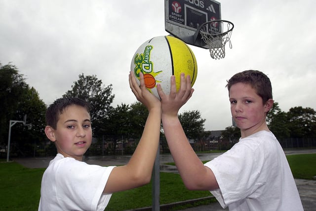Hodgson High School pupils Andrew Hayball (13) and Robert Shelliker (13) on one of the new basketball courts in 2000