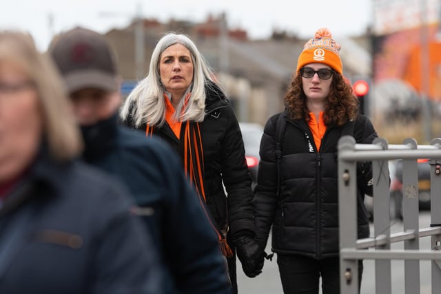 Blackpool fans arrive at Bloomfield Road ahead of the Championship fixture against Burnley. Photo: Kelvin Stuttard