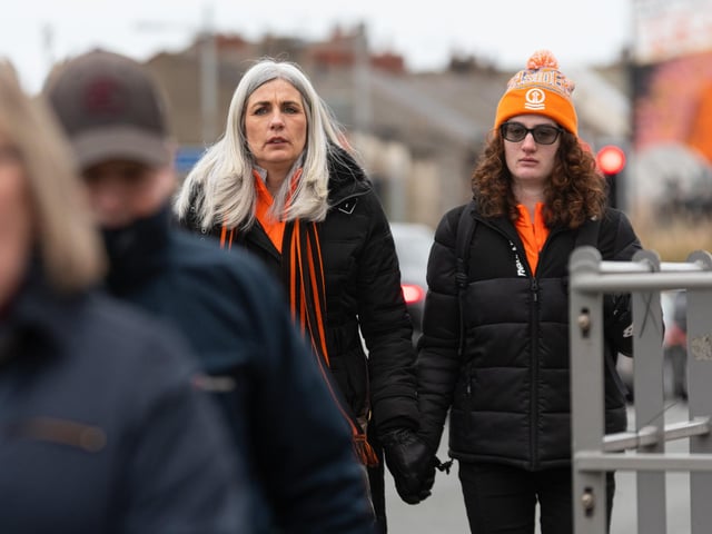 Blackpool fans arrive at Bloomfield Road ahead of the Championship fixture against Burnley. Photo: Kelvin Stuttard