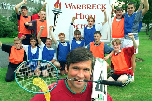 Head of PE Dave Barnes with some of the pupils celebrating an award for sporting excellence, at Warbreck High School, 1997