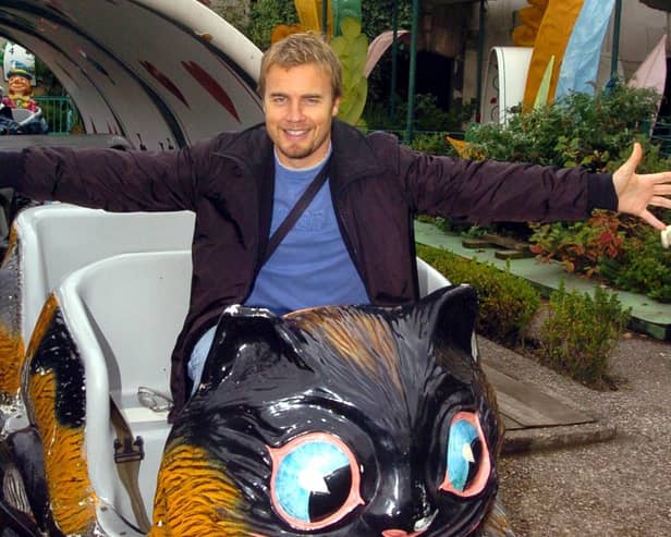 Gary Barlow enjoy a day out at Blackpool Pleasure Beach with his family, 2005