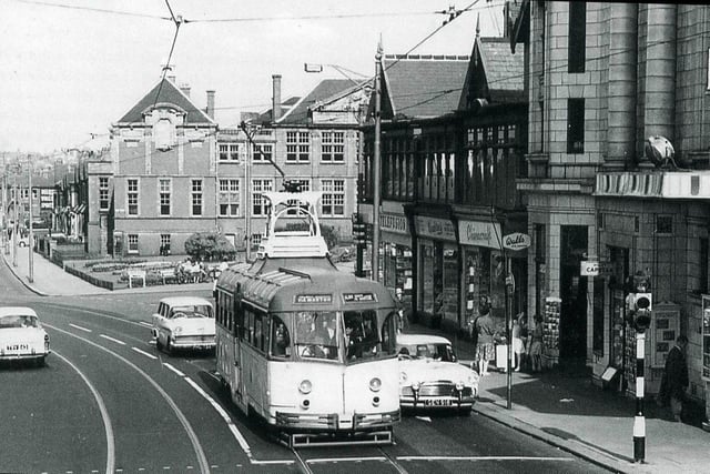 Church Street in the 1950s with a Vambac car waiting at the traffic lights outside the Regent Cinema and the Blackpool Grammar School building behind
