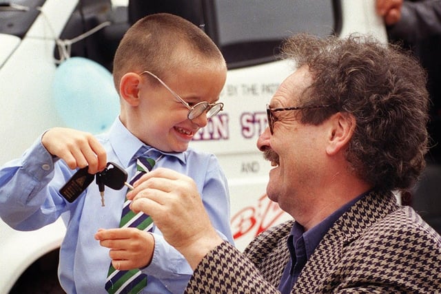 Park school pupil Kieran Bilby, who was 6, is pictured with the later Bobby Ball at the handing over of the schools new Variety Club Sunshine Coach. It was sponsored  by Michael, Sandra and Michelle Nordwind, 1999