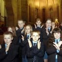 Children from Collegiate High School performing their Cristmas Carol concert in sign language at St Mark's Church, Layton