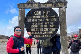 Mark Pilling at the summit of Kilimanjaro