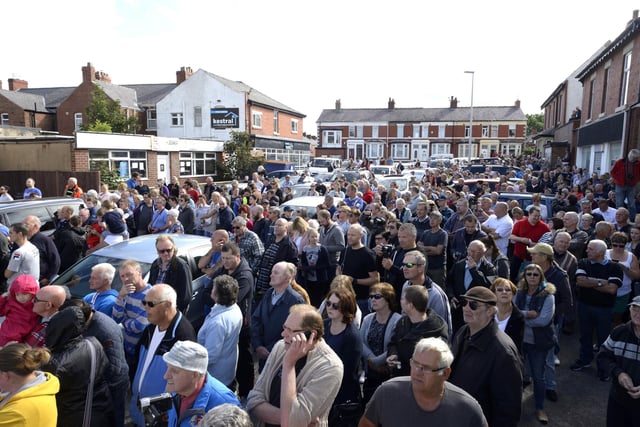 Thousands of people gathered to watch the demolition