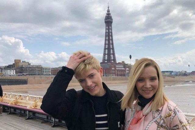 Friends star Lisa Kudrow and comedian Mae Martin smile under Blackpool Tower while taking a break during filming for new Netflix series Mae and George in 2019