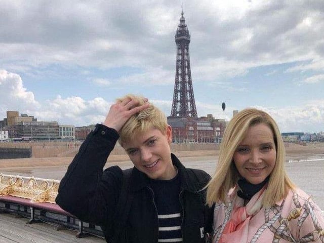 Friends star Lisa Kudrow and comedian Mae Martin smile under Blackpool Tower while taking a break during filming for new Netflix series Mae and George in 2019