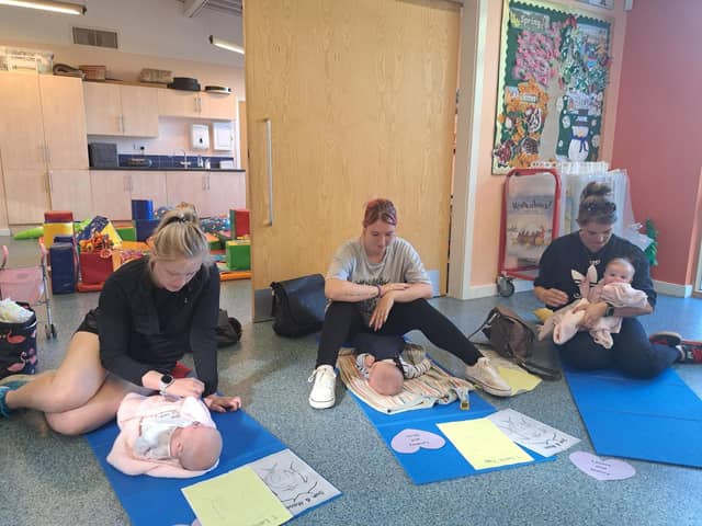 Baby massage is amongst the many activities taking place at some of the new family hubs