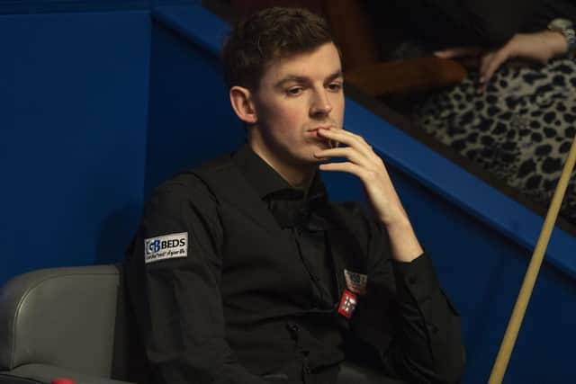 James Cahill was beaten by Barry Hawkins on Wednesday