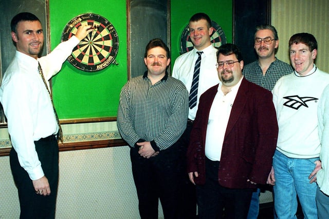 Members of Waterloo Social Club darts team who equalled the world record for a 1,001 team finish. From left, Mark Weber, Ronnie Breverton, Stuart Peacock, Ian Lilley, Paul Williams, Phil Sharples and John Barrow