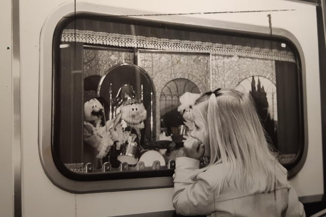 This young lady was intrigued by the updated puppet on a string machine at the Golden Mile Centre