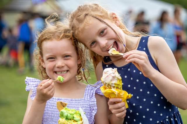 Matilda and Amelie Hadden enjoying ice creams at the festival.