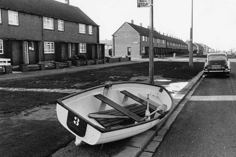 A boat at a bus stop in Chatsworth Avenue after flood water receded follwing the 1977 floods