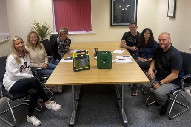 The team at Questa Financial at the Whitehills Business Park have installed a defibrillator at their offices for anyone in cardiac arrest on the estate to use