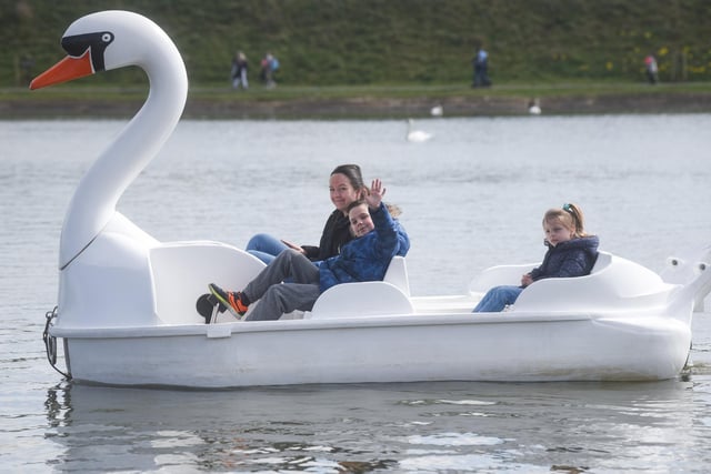 A wave from this youngsters enjoying a ride on the water at the Fairhaven Lake open day.