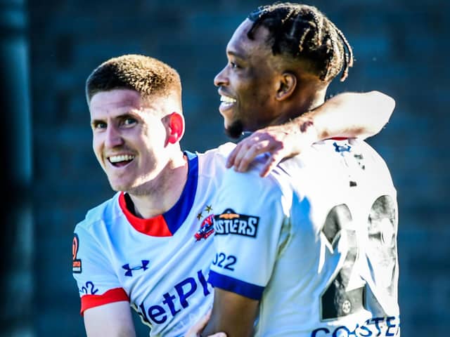 Danny Philliskirk celebrates with Jorome Slew after putting AFC Fylde 3-0 up before half-time against Alfreton
