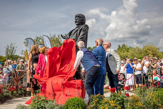 Family, friends and fans gathered as the 9ft sculpture was revealed