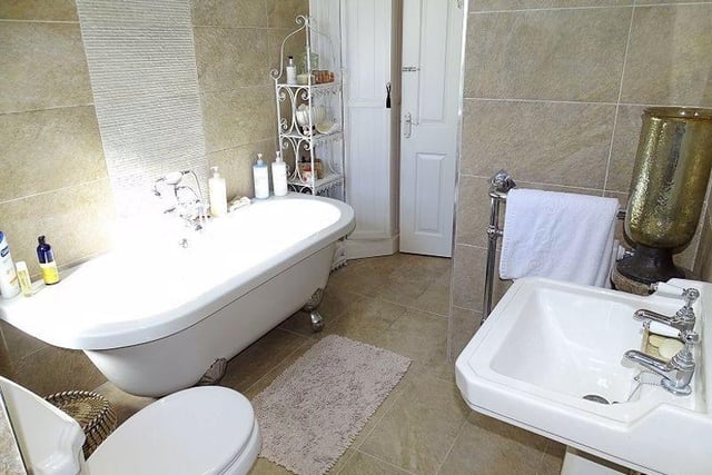 A stylish four piece bathroom suite with a lovely roll top claw foot bath for the family bathroom