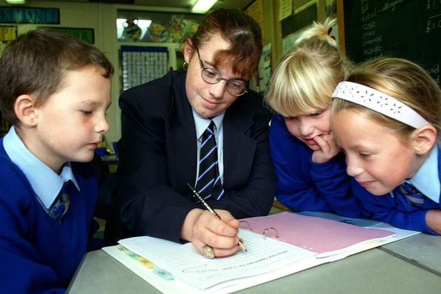 Pupils at Collegiate School were being paid to tutor youngsters at Layton Primary School as part of a scheme pioneered in America.
This photo from 1999 shows 13 year-old Nicola Fowler helping three of her tutor group,  Mark Rushton (8), Gemma Roskell (9) and 8 year-old Amelia Wright.
