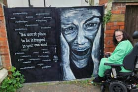 Kirsty Rea with her thought-provoking mural in Blackpool