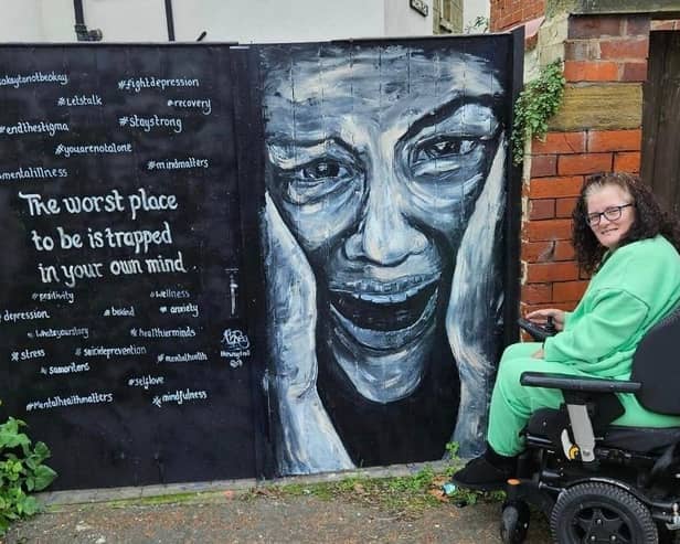 Kirsty Rea with her thought-provoking mural in Blackpool