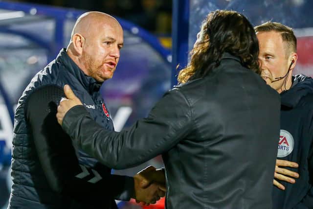 Fleetwood boss Stephen Crainey (left) with Wycombe counterpart Gareth Ainsworth at Adams Park Picture: SAM FIELDING/PRiME MEDIA IMAGES