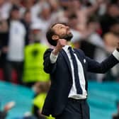 England's coach Gareth Southgate celebrates his team's victory at the end of the UEFA EURO 2020 round of 16 match against Germany.