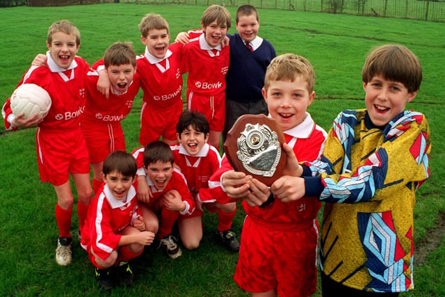 St Mary's and St Andrew's School football team of Barton, near Preston, celebrate winning the Garstang Schools Indoor Football Rally. Pictured: Sam Ormsby and captain Ben Morris hold the trophy with the team (back from left): Ben Hughes, Jason Lowe, Gary Salisbury, Tom Ronson, David Bailey. Front from left: Bruce Desmond, Adam Hayhurst, Sam Worden