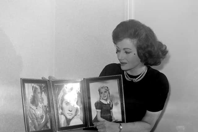 Margaret Lockwood with photographs of her Daughter Julia "Toots" Lockwood in Blackpool, whilst starring in " Signpost to Murder" at the Grand Theatre, 1963