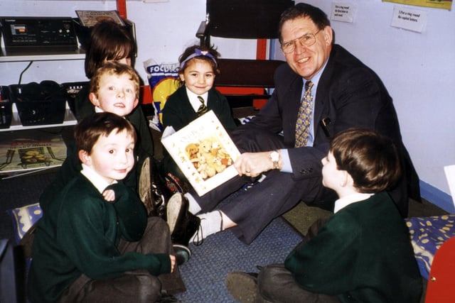 Peter McCarthy, headteacher of St Mary's RC High School in Blackpool, reads stories to children at St Kentigern's RC Primary School as part of their reading week