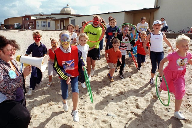 Beach fun time opposite the Marine Hall at Fleetwood. Beach supervisor Norah Hill sets off another race
