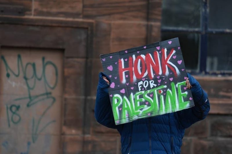 Honk for Palestine.